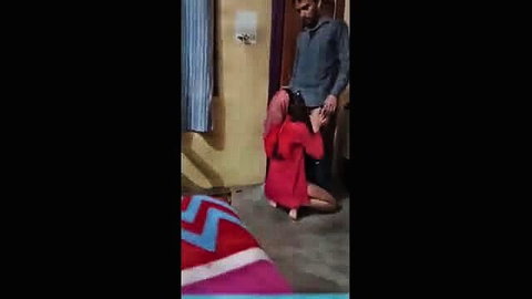 Indian woman kneeling and proposing to man