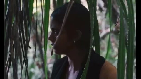 Kani Kusruti smoking topless in jungle, All We Imagine as Light nude scene