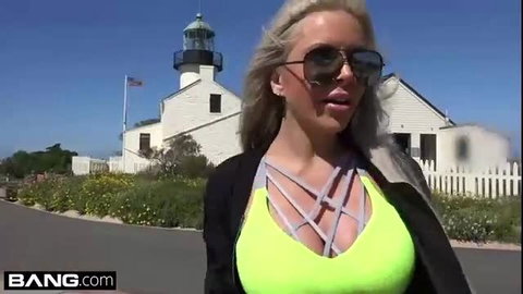 Hot blonde cougar in lime green bra at lighthouse, stripping for sex