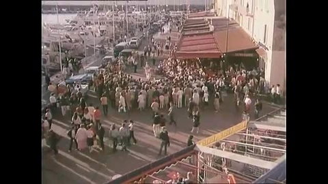 Crowd of excited babes flock to St Tropez marina to release sex tension