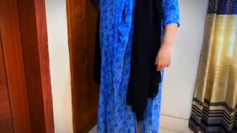 Aria Mia Egyptian Aunty in Blue Dress Shows Curves by Door