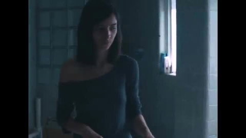 Jocelyn Lopez in dark off-shoulder top, nude sex scene from What Will You Do When God Dies