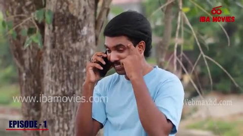 Mature Indian man in blue shirt on phone call outdoors, sensual fetish tease