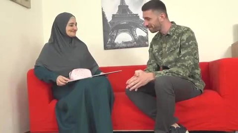 Hijab Muslim mommy in niqab chats with camo guy on couch