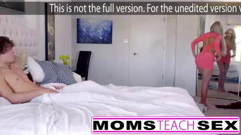 Big-Titted Blonde MILF in red dress teases naked boyfriend on bed