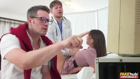 Tru Kait examined by doctors in hospital bed, busty beauty exposed