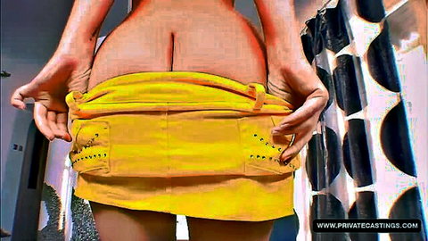 Teen pulls down yellow mini skirt exposing bare ass crack shaved pussy and anus in bathroom