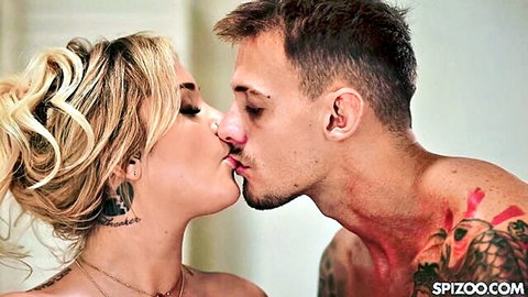 Kali Roses shares passionate kiss with tattooed stud in massage scene