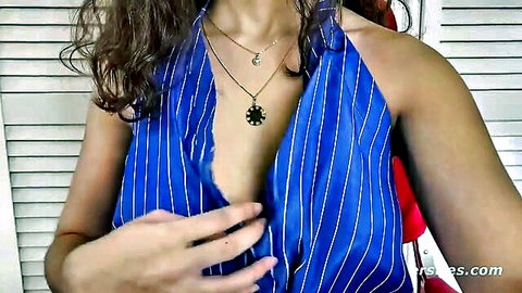 Luna X teasing with cleavage in open blue striped halter dress