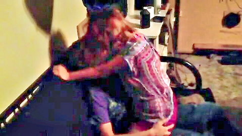 Amateur redhead couple embracing intimately from behind