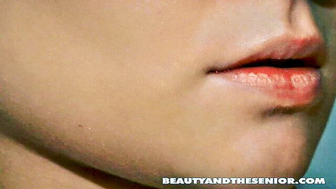 Anabell Bella's close-up lips, young babe in adult scene