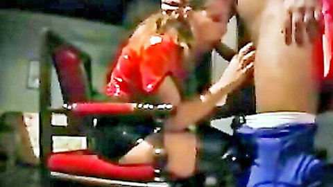 Skinny blonde MILF in red latex grabbing and sucking black man's thick cock