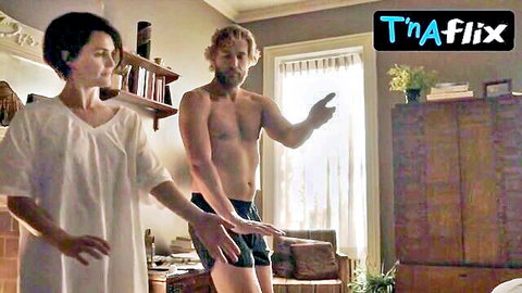 Keri Russell in sexy white dress with shirtless man in The Americans