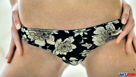 Skinny young babe teasing crotch in tight black floral panties closeup