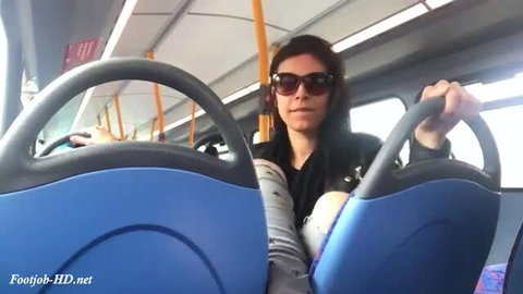 Brunette with sunglasses shows dirty feet on public bus
