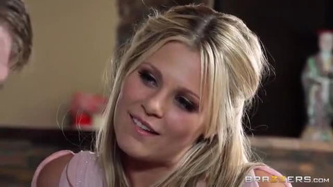 Blonde babe Scarlet Red smiling in pink dress closeup