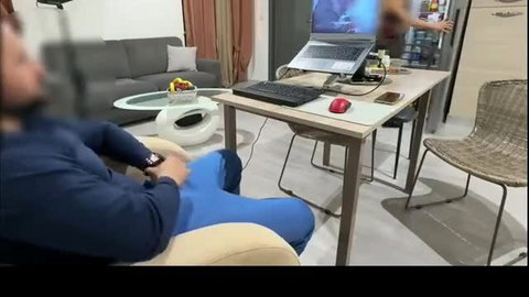 Horny amateur babe blows cock under table in living room