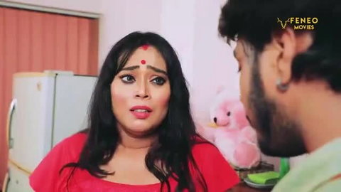 Alluring Indian MILF in red top surprised expression closeup