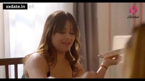 Indian hot babe in lingerie holds knife in erotic tease video