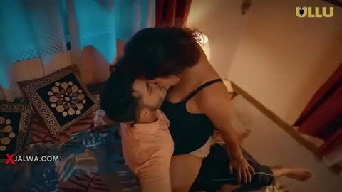 Indian couple passionate kissing in bed, hot web series scene