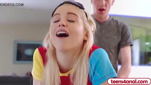 Young blonde teen grinds cock reverse cowgirl, mouth open in ecstasy