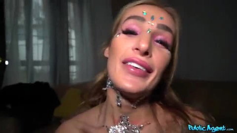 Daisy Lee blonde model with glitter makeup smirks topless on Public Agent