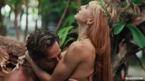Little Dragon nude embraced passionately by man in jungle paradise