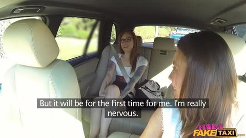 Nervous redhead teen in skirt chats with busty brunette in Fake Taxi