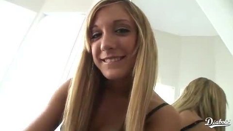 Blonde teen in tank top smiles in mirror selfie for bubble butt delight