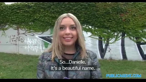 Blonde Danielle smiles in Public Agent outdoor casting video