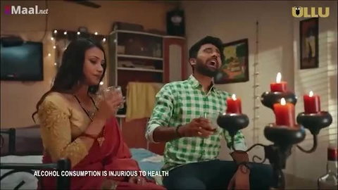 Indian beauty in saree drinks with man in steamy adult scene