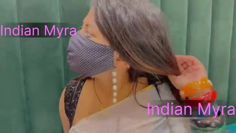 Shameless Indian wife in sheer saree showing cleavage, grey hair