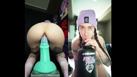 Inked girl with braids rides huge green standing dildo ecstatic