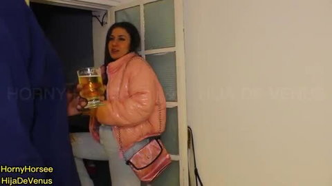 Kate Dalia in pink puffer jacket holding beer at door, hot Latina teen