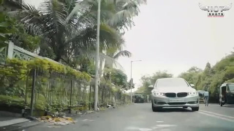 Indian babe in silver BMW on tropical street sex scene thumbnail