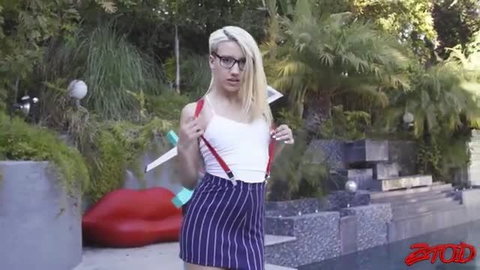 Blonde babe in glasses and suspenders skirt teases outdoors