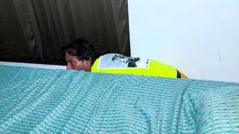 Milan peeking from bed in yellow shirt, hot Indian web series
