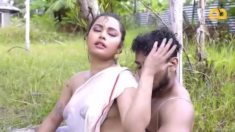 Wet Indian babe in sheer saree gets intimate outdoors with hunk