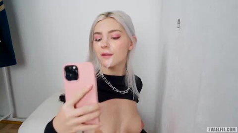 Eva Elfie blonde babe selfie in crop top, teasing lips and tits