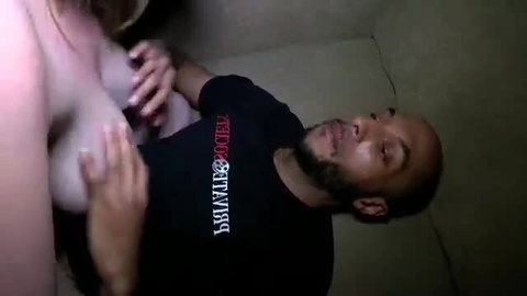 Black man motorboating white woman's huge pale tits in intimate sitting POV