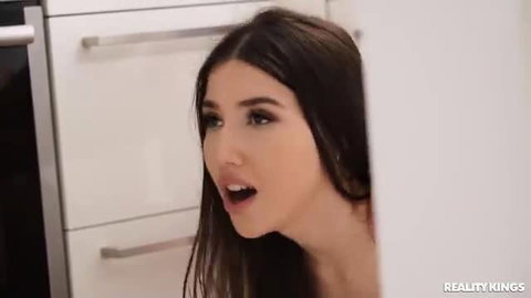 Lisa Belys with open mouth in hot kitchen tease