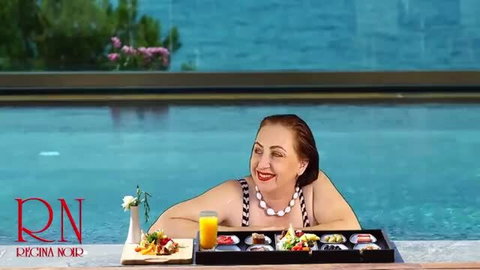 Regina Noir curvy MILF teases with big tits at nudist hotel pool