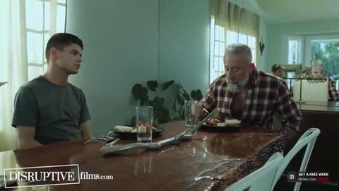 Handsome stepson shares intimate dinner with muscular bearded stepdad