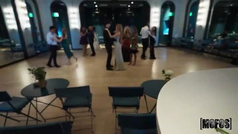 Becky Summer in elegant ballroom dress at dance party