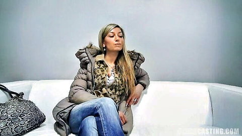 Hot blonde amateur in casting couch sits pensively in puffy fur jacket and jeans