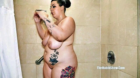 Curvy tattooed BBW with huge hanging tits nude in shower sucking showerhead