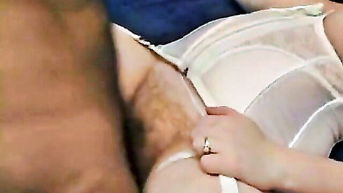 Hairy ebony hand yanks down white MILF's lace bra exposing huge natural pale tits