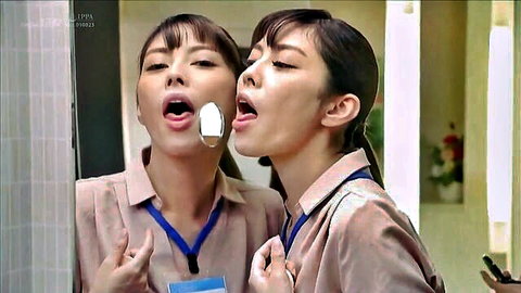 Japanese women in uniforms tease with tongues and mirrors in gloryhole JAV