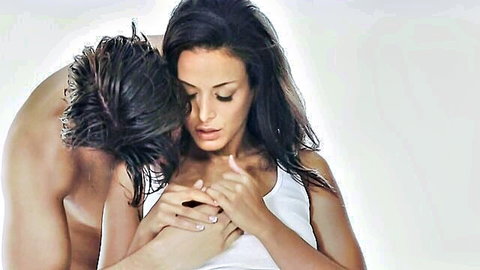 Shirtless hunk passionately kisses sexy brunette's neck while embracing her small tits in tank top