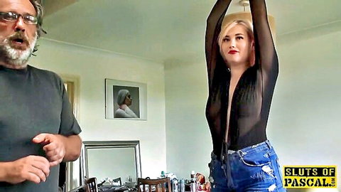 Blonde British sub in sheer black top posed for older dom, slapped and choked scene